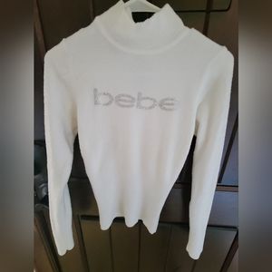 White turtleneck sweater